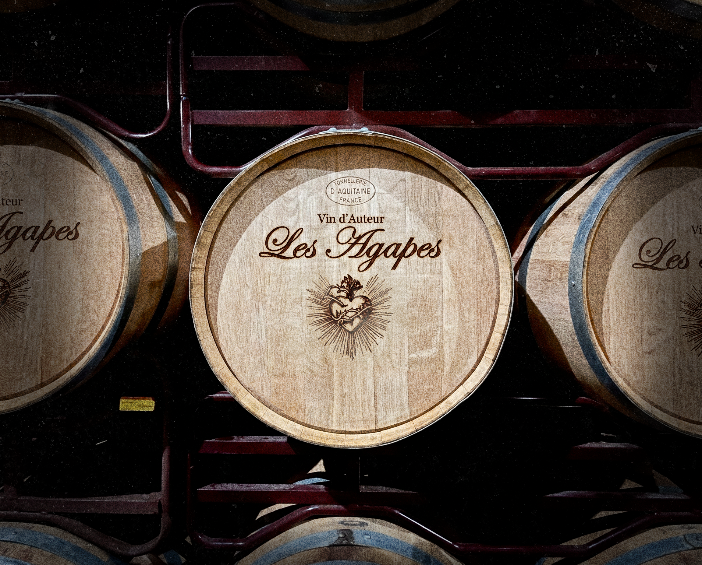 Les Agapes - Wine Bottles on Barrels